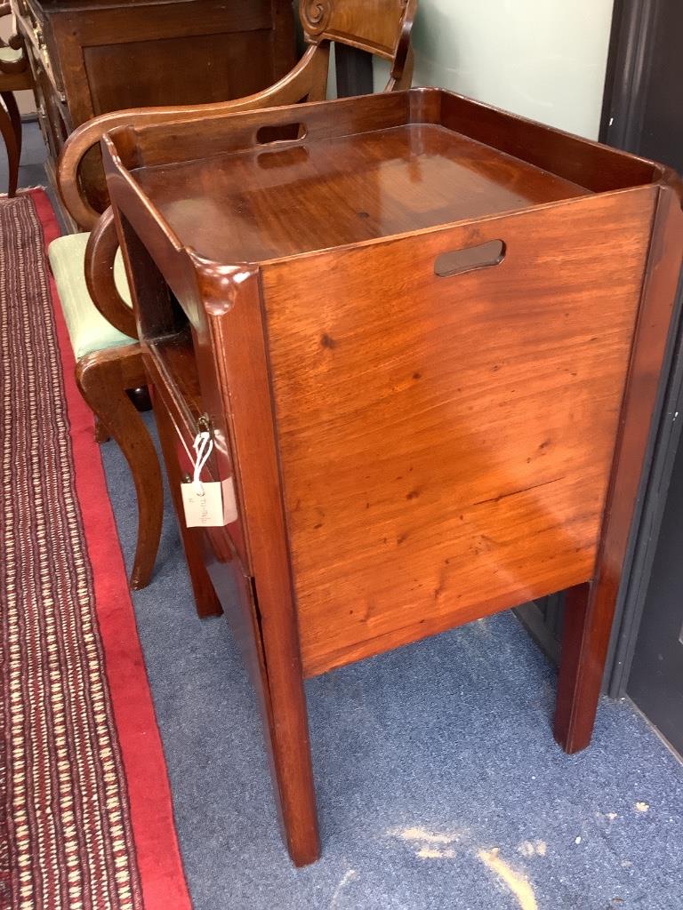 A Georgian mahogany tray-top commode, having tambour shutter on square supports, width 50cm depth 45cm height 78cm